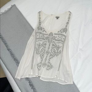 Flowy tank with open back